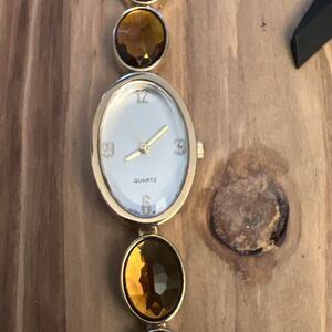 Unbranded Gold Tone Ladies Watch With Gems